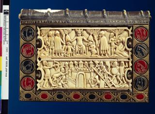 Fragments of a comb (peigne double); reused as part of the binding of a book (Front)