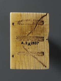 Diptych, with quatrefoils (quatre-feuille); reused as part of the binding of a book (Wing, left, back)