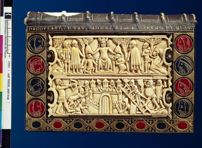 Fragments of a comb (peigne double); reused as part of the binding of a book (Front)