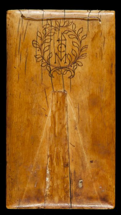 Wing, right (fragment of a diptych), 1 register, 1 arch across, band of rosettes (plaquette; décor de roses); reused as a pax (baiser de paix) (Back)