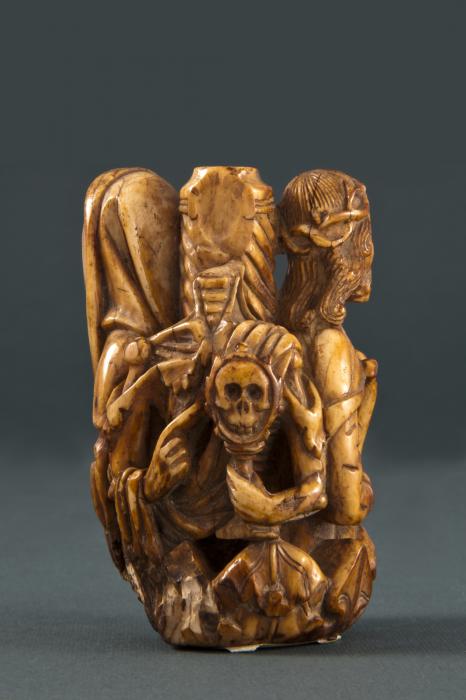 Fragment of a staff or crozier (?), 3 faces (Front)