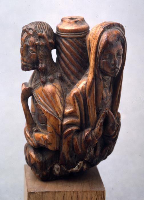 Fragment of a staff or crozier (?), 3 faces (Front)