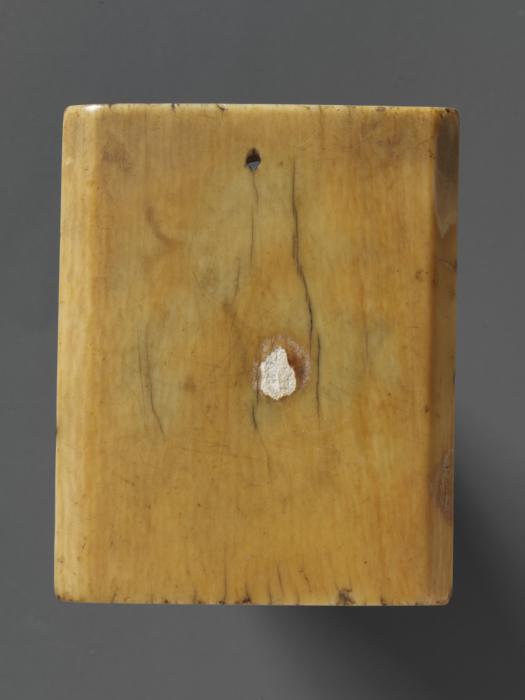 Wing, right (fragment of a diptych; lower register), 1 register, 1 arch across (plaquette) (Back)