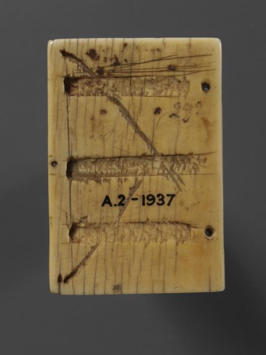 Diptych, with quatrefoils (quatre-feuille); reused as part of the binding of a book (Wing, right, back)