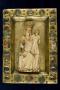 Relief (appliqué); used as part of the binding of a book (Front)