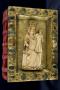 Relief (appliqué); used as part of the binding of a book (Front)