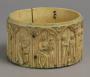 Cylindrical pyxis, with arches and rosettes (pyxide; frise d'arcatures; décor de roses; colonnettes) (Side)