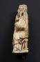 Statuette or pommel (Side, left)