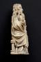 Statuette or pommel (Side, right)