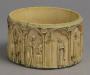 Cylindrical pyxis, with arches and rosettes (pyxide; frise d'arcatures; décor de roses; colonnettes) (Side)